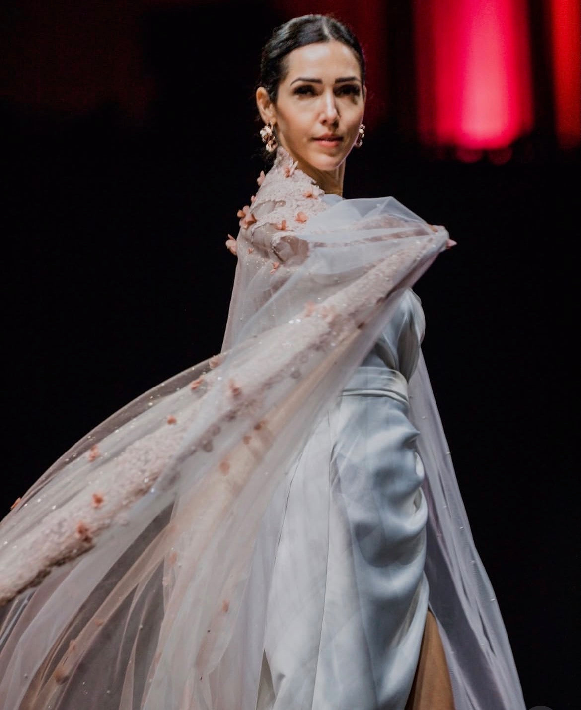 White satin gown and sheer floral cape