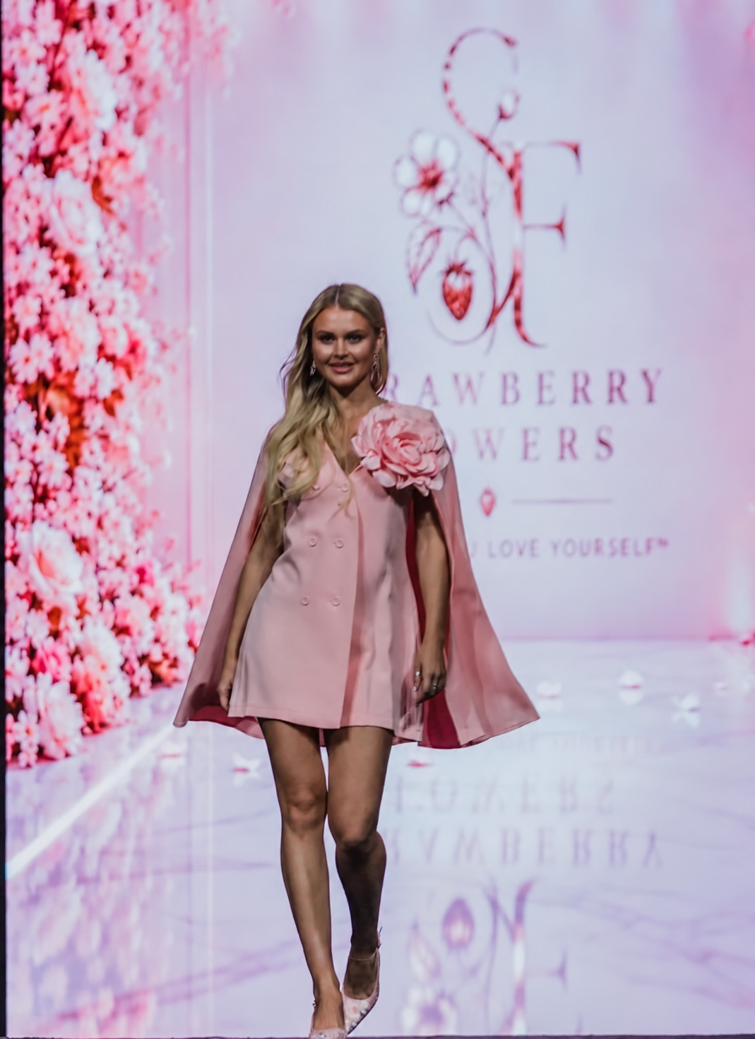 Pink cape blazer dress on the Strawberry Flowers runway